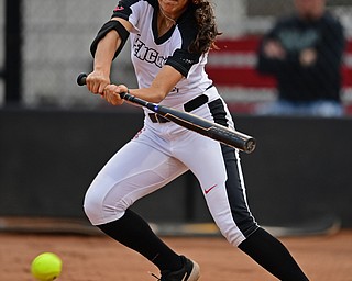 YOUNGSTOWN, OHIO - APRIL 12, 2019: Youngstown State's Yazmine Romero hits a single in the first inning of their game, Friday night against Cleveland State at the Youngstown State softball complex. Youngstown State won 3-0. DAVID DERMER | THE VINDICATOR