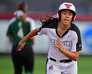 YOUNGSTOWN, OHIO - APRIL 12, 2019: Youngstown State's Yazmine Romero runs to third before going home to score on a RBI-double by Grace Cea in the third inning of their game, Friday night against Cleveland State at the Youngstown State softball complex. Youngstown State won 3-0. DAVID DERMER | THE VINDICATOR