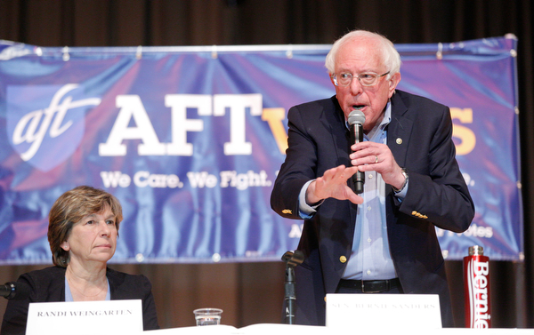 Sen. Bernie Sanders speaks while Randi Weingarten sits next to him during the union town hall at Lordstown High School Sunday afternoon. EMILY MATTHEWS | THE VINDICATOR