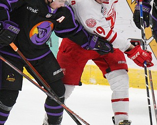 William D. Lewis The Vindicator Phantoms Gianfrancisco Cassaro(23) and Dubuques  Derek Contessa(19 during 4-15-19 action in Youngstown.