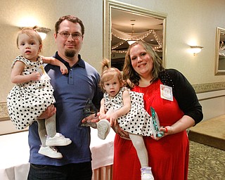  ROBERT K.YOSAY  | THE VINDICATOR..Trumbull Children Services Rising up - Moving On to honor those who have overcome problems in their life or stepped up to help children.at  CimineroÕs Banquet Hall in Niles..Kristen Trumbull and Justin Bishop with Alicia and Tatiana - twin 1 year olds....Jessica Watkins presented the award