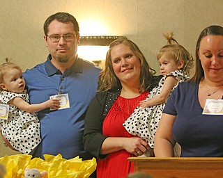  ROBERT K.YOSAY  | THE VINDICATOR..Trumbull Children Services Rising up - Moving On to honor those who have overcome problems in their life or stepped up to help children.at  CimineroÕs Banquet Hall in Niles..Kristen Trumbull and Justin Bishop with Alicia and Tatiana - twin 1 year olds....Jessica Watkins presented the award