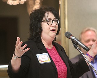  ROBERT K.YOSAY  | THE VINDICATOR..Trumbull Children Services Rising up - Moving On to honor those who have overcome problems in their life or stepped up to help children.at  CimineroÕs Banquet Hall in Niles..Executive Award Winner  Bonnie Wilson with Tim Schaffner