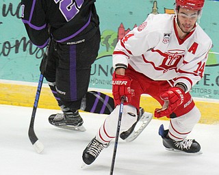 William D. Lewis The Vindicator Phantoms Brett Murray (21) and Dubuque's JD Greenway(24)during 4-16-19 playoff game.