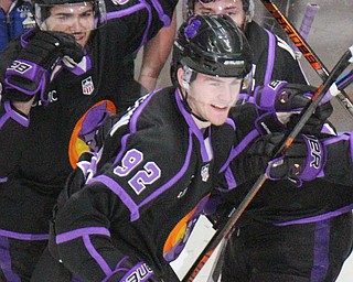 William D. Lewis The Vindicator Phantoms Gianfrancio Cassaro(23) moves the puck around Dubuque's Reise Garber(22)) blocks a shot during 4-16-19 playoff game.