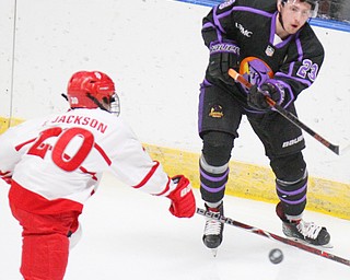 William D. Lewis The vindicator Phantoms Gianfranciso Cassaro(23) fires the puck past Dubuque's Ty Jackson(20)during 4-16-19 playoff game in Younstown.