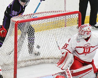 William D. Lewis The Vindicator Phantoms Liam Robertson(92) moves the puck around Dubuque goalie Matthew Thiessen(35) during 4-16-19 playoff game.