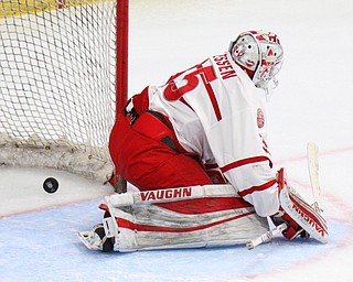 William D. Lewis The Vindicator Dubuque goalie Matthew Thiesesen(35) misses shot by Phantoms Liam Robertson for a 1rst period goal during 4-16-19 playoff game.