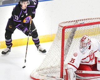 William D. Lewis The Vindicator Phantoms Matthew Barnaby(77) moves the puck around Dubuque goalie Matthew Thiessen(35)during 4-16-19 playoff game.