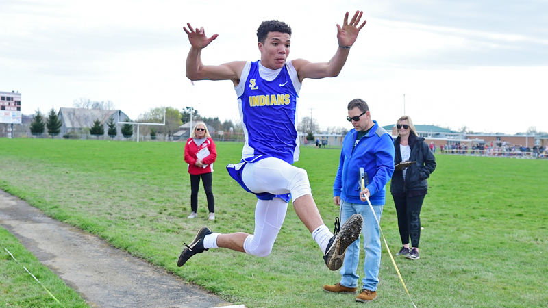Jayce Sloan of Southern Local High School competes during the boys long jump Tuesday afternoon at Columbiana High School. 