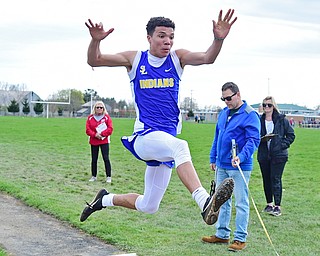Jayce Sloan of Southern Local High School competes during the boys long jump Tuesday afternoon at Columbiana High School. 