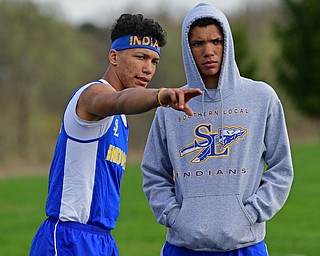 COLUMBIANA, OHIO - APRIL 16, 2019: Southern Local's Brady Sloan, left, and Jayce Sloan discuss strategy while waiting for their turn during the boys long jump, Tuesday afternoon at Columbiana High School. DAVID DERMER | THE VINDICATOR