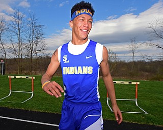 COLUMBIANA, OHIO - APRIL 16, 2019: Southern Local's Brady Sloan stretches while waiting for his turn during the boys long jump, Tuesday afternoon at Columbiana High School. DAVID DERMER | THE VINDICATOR