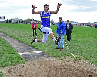 COLUMBIANA, OHIO - APRIL 16, 2019: Southern Local's Jayce Sloan competes during the boys long jump, Tuesday afternoon at Columbiana High School. DAVID DERMER | THE VINDICATOR