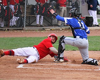 William D. Lewis The Vindicator Niles' Nick Guarnieri(7) is out at home during 1rst inning of 4-1719 game at Niles. making the tag for Poland is Andrew Testa(11).