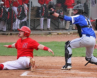 William D. Lewis The Vindicator Niles' Nick Guarnieri(7) is out at home during 1rst inning of 4-1719 game at Niles. making the tag for Poland is Andrew Testa(11).