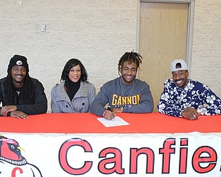 Neighbors | Abby Slanker.Canfield High School senior football player Mehlyn Clinkscale announced his intention to continue his academic and football career at Gannon University at a letter of intent signing ceremony at the high school on March 29. Joining Clinkscale at the signing were his family, from left, Doan McKinney, Sheila Jones and Jantz Clinkscale, Jr.