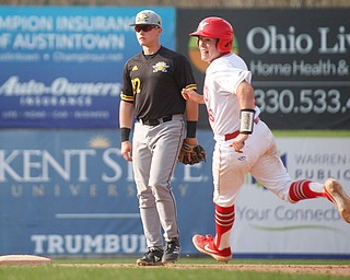 YSU's Dylan Swarmer steals second during their second game against NKU on Thursday. EMILY MATTHEWS | THE VINDICATOR