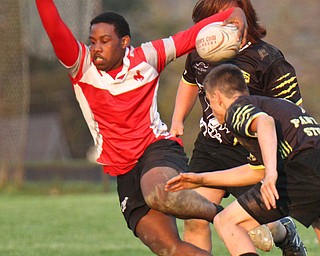 William D. Lewis The Vindicator Chaney's Jason Jackson(9) eludes Massion defenders.