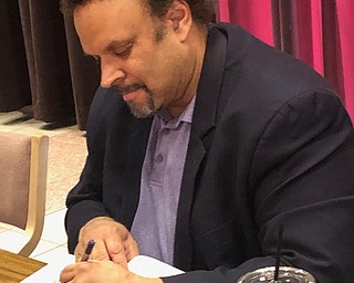 Neighbors | Submitted.Nationally known author Neal Shusterman signed books for attendees of YSU's 41st annual English Festival event.