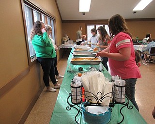 Neighbors | Jessica Harker.Community members enjoyed dinner made by Boardman Park employees as they watched Easter themed movies April 10 and 11 at the 16th annual Evening with the Easter Bunny event.