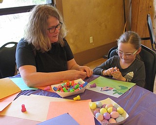 Neighbors | Jessica Harker.Children were able to use stamps to create Easter crafts April 10 and 11 at the Boardman Park's Evening with the Easter Bunny event.