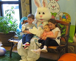 Neighbors | Jessica Harker.A professional photographer was on hand at the Boardman Park April 11 to take photos of families with the Easter Bunny during the annual Evening with the Easter Bunny event.