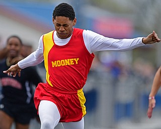 AUSTINTOWN, OHIO - APRIL 20, 2019: Mooney's Shamar Brooks crosses the finish line during the boys 100 meter dash during the Mahoning County Track & Field Championship Meet at Austintown Fitch High School. DAVID DERMER | THE VINDICATOR