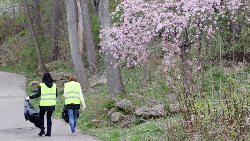 Staff members from the Geauga Trumbull Solid Waste District and others kicked off the Great American Cleanup by picking up trash along Veterans Memorial Riverwalk and near the log cabin and Trumbull County Veterans Memorial.