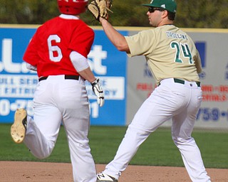 William D. Lewis The Vindicator  Girard's Nick DeGregory(6) is out at 1rst as Ursuline firstbaseman Andrew Sabella (24) makes the catch during 4-24-19 action at Cene.