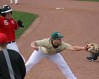 William D. Lewis The Vindicator  Girard's Andrew Delgarbino(15) iw safe at first as Ursuline FBman Andrew Sabella(24) misses the catch during 4-24-19 game  at Cene.