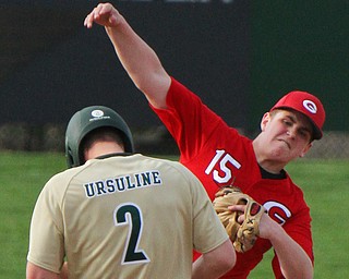 William D. Lewis The Vindicator  Girard's Andrew Delgarbino(15) tries to turn a double play as Ursuline's Jqke Freisen(2) is out at 2nd during 4-24-19 game at Cene.