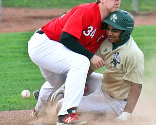 William D. Lewis The Vindicator  Girard 3rd baseman Matt Miles(34) loses control of the ball as Ursuline's Dante Walker(27) is safe at 3rd during 4-24-19 game  at Cene.