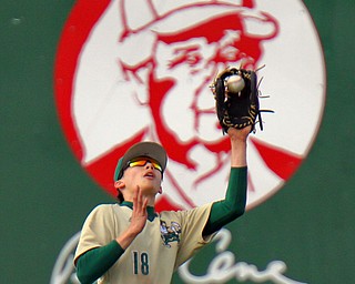 William D. Lewis The Vindicator  Ursuline's Jeremy Kreuzwieser(18) pulls in a flyball during 4-24-19 game with Girard at Cene.