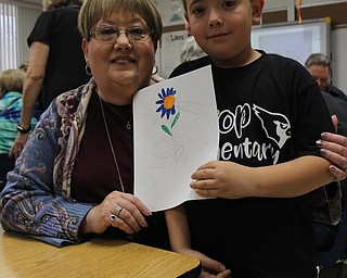 Neighbors | Abby Slanker.Hilltop Elementary School first-grade student Ben Smith completed an art project with his grandmother, Linda Davis, during the school’s annual Grandparents Day on March 14.