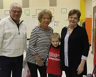 Neighbors | Abby Slanker.Hilltop Elementary School first-grade student Cole Toot celebrated the school’s annual Grandparents Day with his grandparents, from left, Lee Dull, Diane Dull and Darla Engle on March 14.