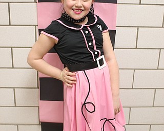 Neighbors | Abby Slanker.C.H. Campbell Elementary School third-grade student Nyah Navarro got into the spirit of the theme of Sock Hop for the school’s annual Spring Fest on March 22.