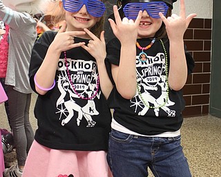 Neighbors | Abby Slanker.Two C.H. Campbell Elementary School students checked out the photo booth, and its props, at the school’s annual Spring Fest on March 22.
