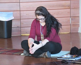 Neighbors | Jessica Harker .Librarian Hannah Matulek hosted the monthly meditation and relaxation event on March 25 at the Michael Kusalaba library.
