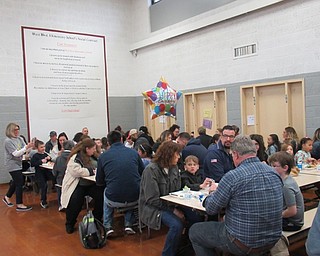 Neighbors | Jessica Harker .Aunts, cousins, moms, dads and more visited West Boulevard Elementary to share lunch with their second-grade students on March 21.