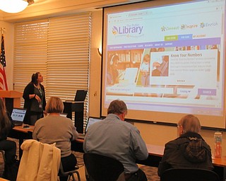 Neighbors | Jessica Harker .Renee Beverly, a librarian at the Austintown branch, hosted an Introduction to Hoopla event April 4, where community members could learn about the free streaming service offered by the library.