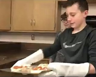 Neighbors | Submitted.Students created and baked english muffin pizzas for class in Poland.