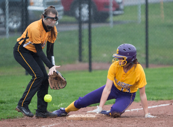 Champion's Abbi Grace slides safely into third before the ball gets to Crestview's Shianna Mathes during their game at Champion High School on Thursday. Champion won 10-0 with a mercy rule in the fifth inning. EMILY MATTHEWS | THE VINDICATOR