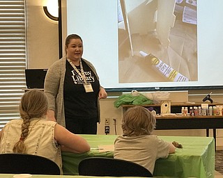 Neighbors | Jessica Harker.Librarian Amelia Dale hosted the Build a Birdhouse event on April 17 at the Austintown library.