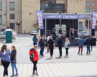 People watch the Dreemers perform at the Summit's 330 Stage during Federal Frenzy on Saturday. EMILY MATTHEWS | THE VINDICATOR