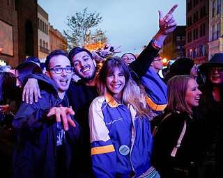 From left, Cole Stanich, Drew Wagner, and Alison Green, all of Boardman, pose for a photo as they listen to Spirit of the Bear perform at Penpro Main Stage during Federal Frezny on Saturday night. EMILY MATTHEWS | THE VINDICATOR