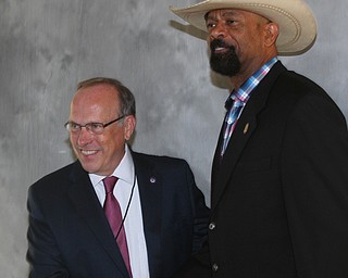 William D. Lewis The vindicator  Former Milwaukee Sheriff David Clarke was speaker at Mahoning County Republican PartyÕs Lincoln Day dinner Tuesday at the Maronite Center 4-3-19. He is shown with Mark Munroe former Mahoning County Reublican chairman.
