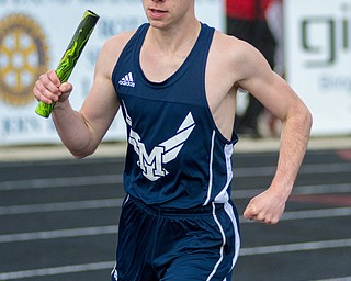 Connor Symbolik of McDonald fights to make up ground in the 3,200-meter relay finals at the Trumbull County Track and Field Meet on Tuesday. The Blue Devils claimed victory in the race.