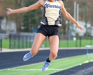 Diamond Phillips of Warren G. Harding soars to the win in the long jump at the Trumbull County Track and Field Meet on Tuesday..?.