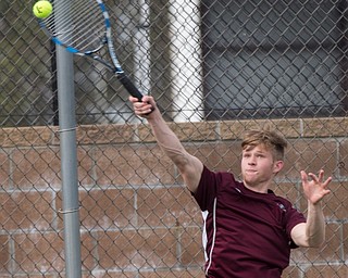 Boardman's Peyton Curtis hits the ball back to Ursuline's Austin Arfaras during their match at Boardman on Wednesday. EMILY MATTHEWS | THE VINDICATOR